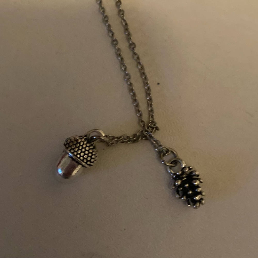 Pinecomb and accord silver necklace
